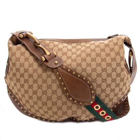 buying an authentic gucci pelham shoulder bag ii